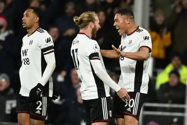 Carlos Vinicius celebrates scoring against Chelsea.