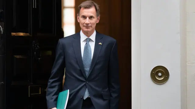 Chancellor Jeremy Hunt leaves 11 Downing Street