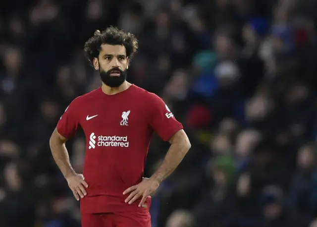 Liverpool players look deflated after conceding a second goal