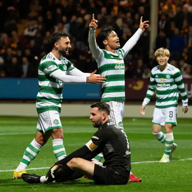 Reo Hatate celebrates scoring Celtic's third against Motherwell