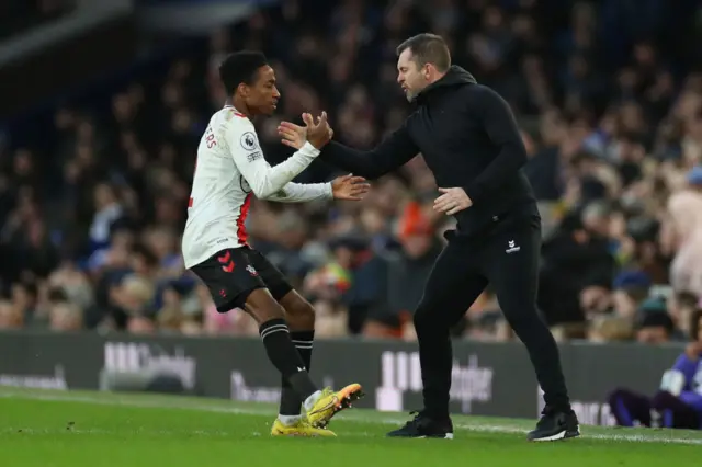 Southampton boss Nathan Jones congratulates Kyle Walker-Peters