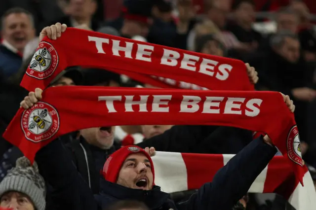 Brentford fans cheer on their side.