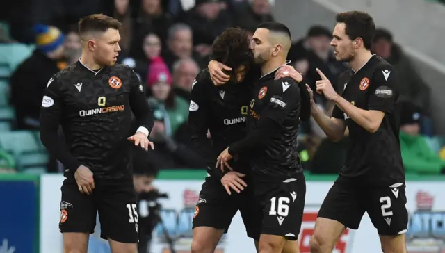 Dundee United's Ian Harkes celebrates after making it 2-1 during a cinch Premiership match between Hibernian and Dundee United at Easter Road