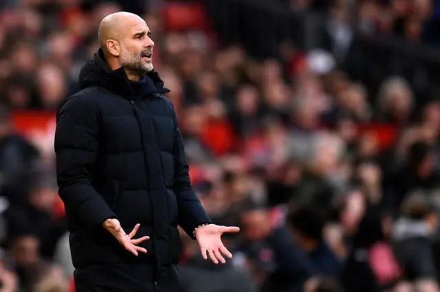 Man City boss Pep Guardiola cuts an irritated figure on the sidelines.