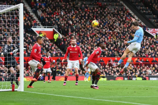 Jack Grealish heads Man City into the lead in the Manchester Derby.