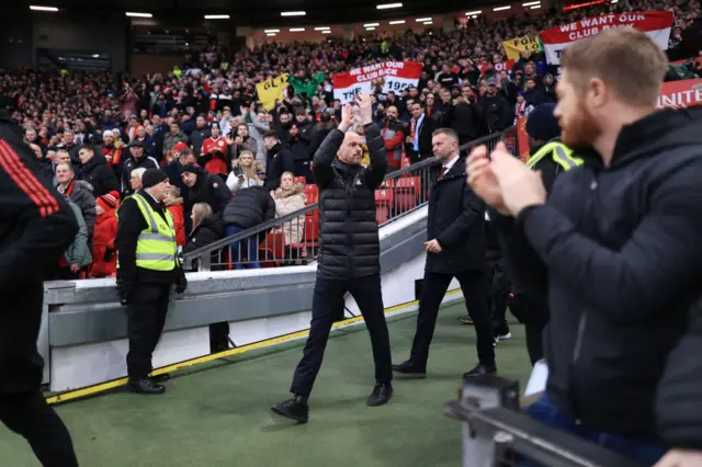 Manager Erik ten Hag gees up the Man Utd crowd before the second half.