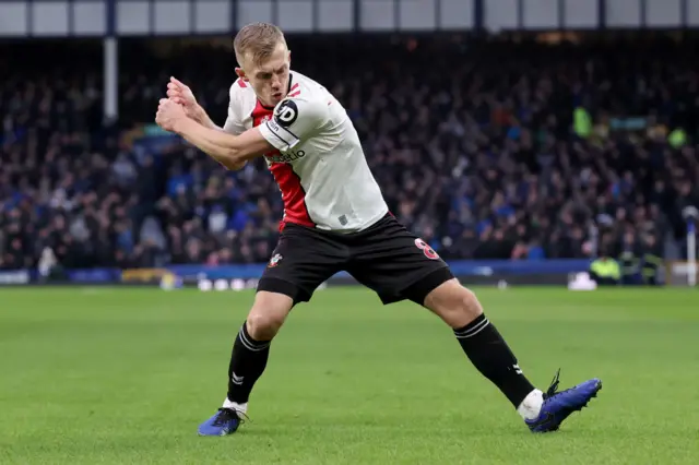 James Ward-Prowse performs his signature golf swing celebration.