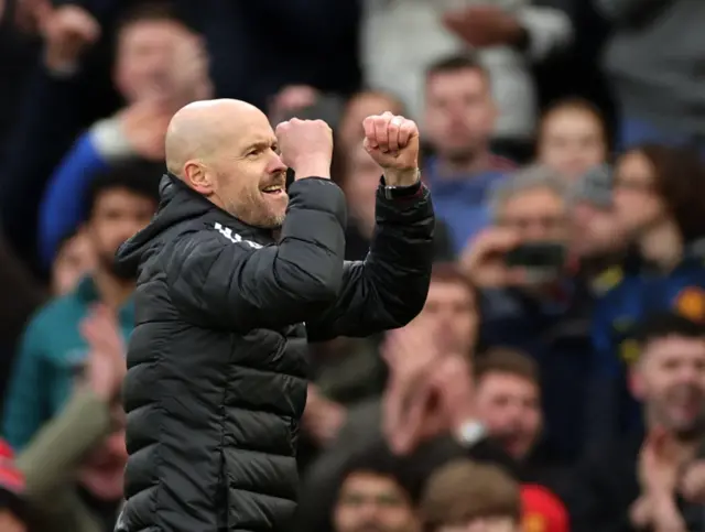 Man Utd manager Erik ten Hag celebrates with the home fans.