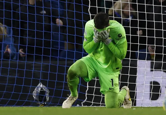 Liverpool keeper Alisson shouts into his hands after conceding the opening goal.