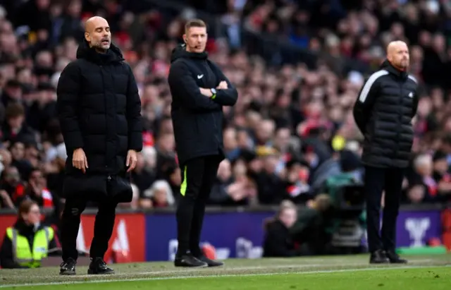 Man City boss Pep Guardiola cuts a frustrated figure on the touchline.