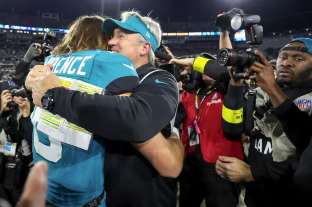 Doug Pederson and Trevor Lawrence celebrate