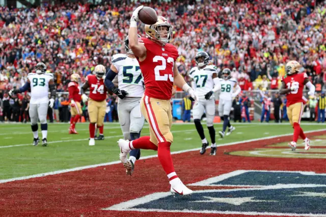 Christian McCaffrey scores for the San Francisco 49ers.