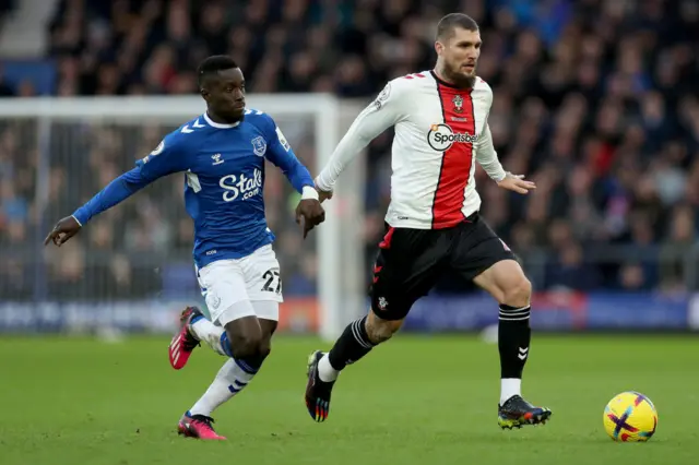 Southampton's Lyanco holds off a challenge from Everton's Idrissa Gueye.