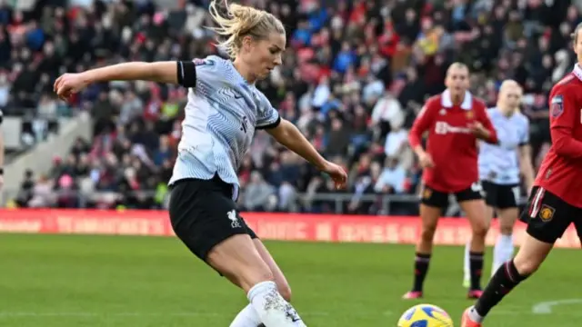 Gemma Bonner playing a cross