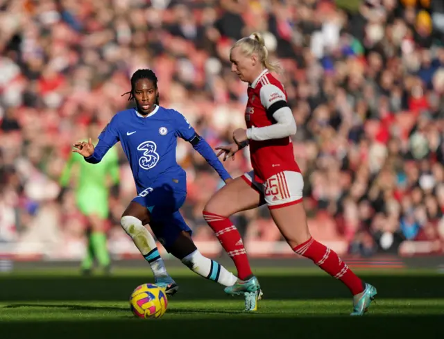 Stina Blackstenius wards off a challenge from Chelsea's Kadeisha Buchanan.