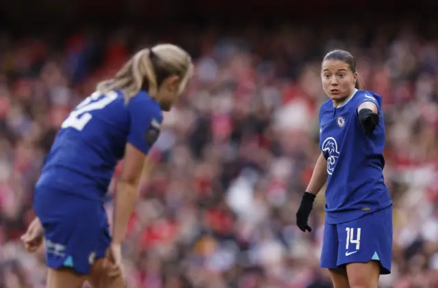 Fran Kirby hands instructions to Chelsea team-mate Erin Cuthbert.