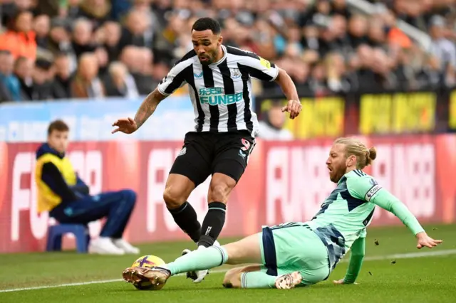 Callum Wilson of Newcastle attempts to dribble down the wing.