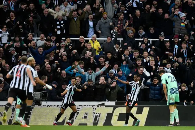 Alexander Isak celebrates scoring a late winning goal for Newcastle.