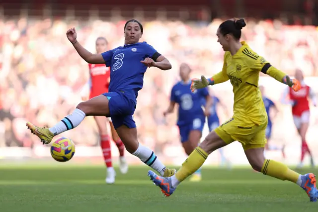 Chelsea forward Sam Kerr chases down the ball.