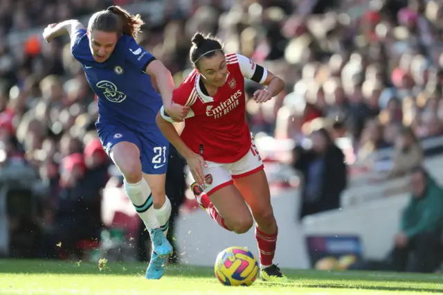 Arsenal's Caitlin Foord sprints away from a challenge.