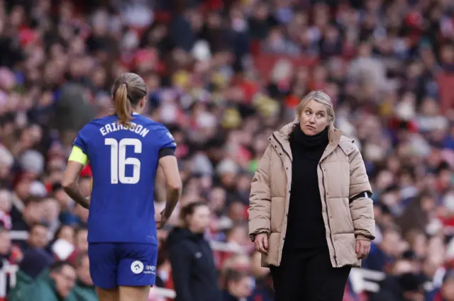 Chelsea manager Emma Hayes speaks to captain Magda Eriksson.