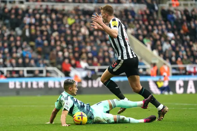 Dan Burn denies pulling Andreas Pereira to the floor.