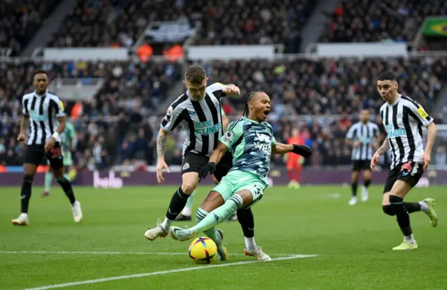 Bobby Decordova-Reid is tripped by Kieran Trippier in the box.