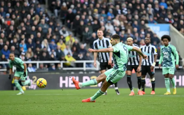 Aleksandr Mitrovic slips while taking a penalty.