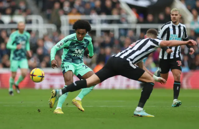 Willian of Fulham attempts to dribble through midfield.