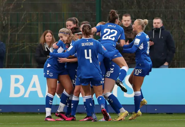 Everton players celebrate going into the lead against Reading.