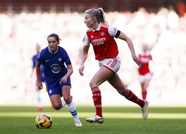 Arsenal defender Leah Williamson clears the danger for her side.