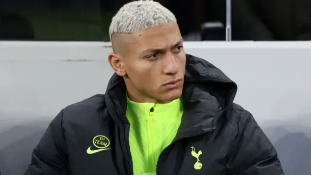 Richarlison watching from the bench