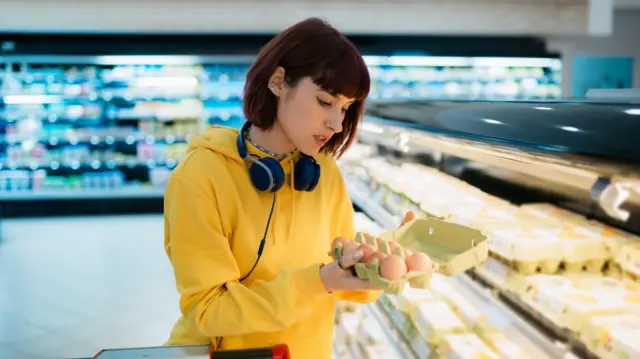 woman buying eggs