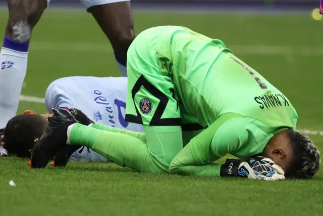 Kaylor Navas and Cristiano Ronaldo both lay on the floor injured after Navas took out Ronaldo