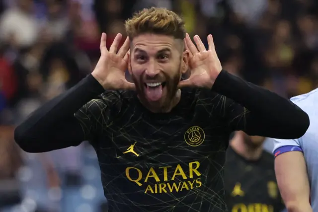 Sergio Ramos celebrates after scoring PSG's third goal from the edge of the six yard box