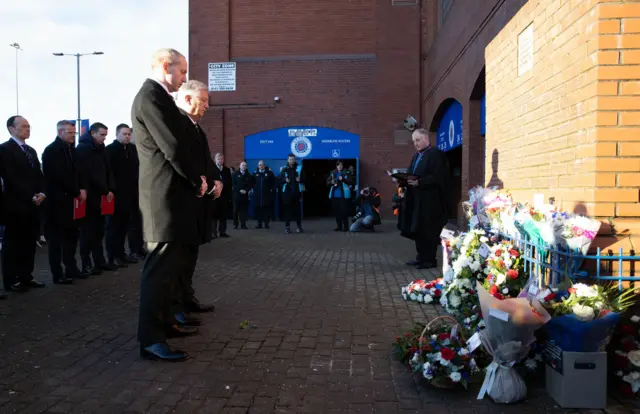 Celtic Director Michael Nicholson and Executiev Peter Lawell lays a wreath in memory of those who lost their life during the Ibrox disaster during a cinch Premiership match between Rangers and Celtic