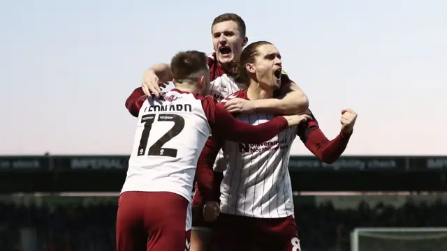 Northampton Town players celebrate