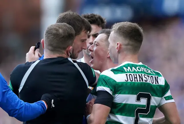 Rangers' Borna Barisic and Celtic's Callum McGregor have words during the cinch Premiership match at Ibrox Stadium,