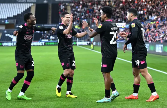 Burnley players celebrate