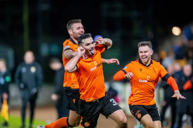 Tony Watt celebrates scoring the winning goal for Dundee Utd