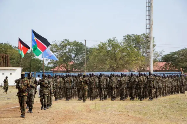 New members of South Sudan People's Defence Forces (SSPDF) of the Unified Forces who have been on training since the implementation of the revitalized peace agreement in 2018 perform during their graduation ceremony in Malakal on November 21, 2022