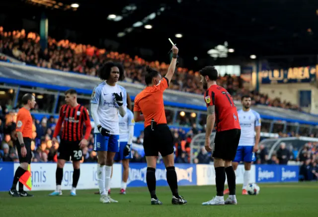 Rebecca Welch shows a card during Birmingham v Preston