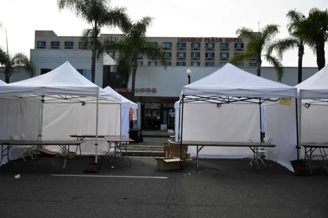 Lunar new year fair stalls stand empty after it was cancelled following a mass shooting