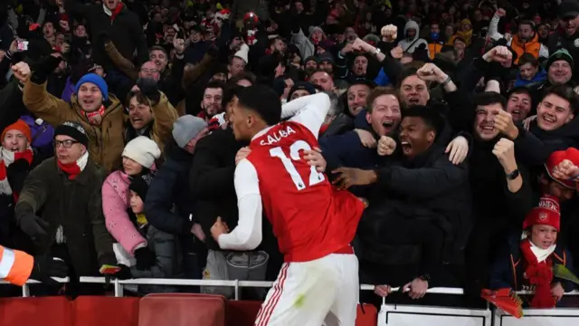 William Saliba celebrating with fans