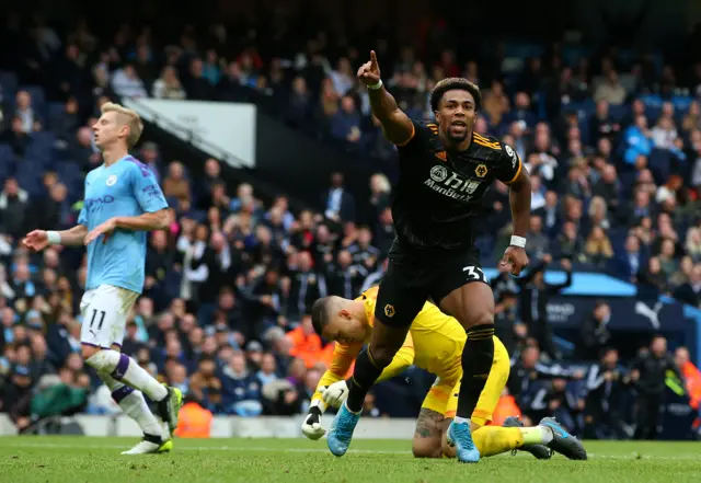 Adama Traore celebrates scoring at Man City