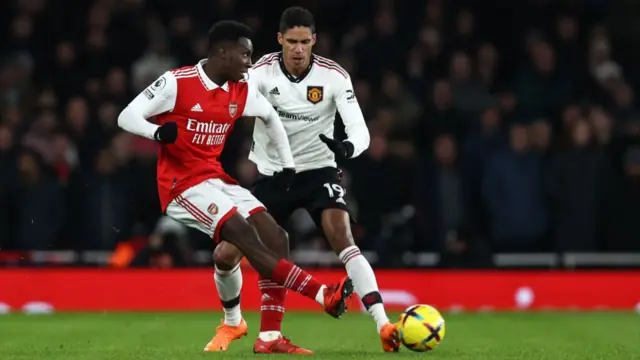 Eddie Nketiah and Raphael Varane during the game.