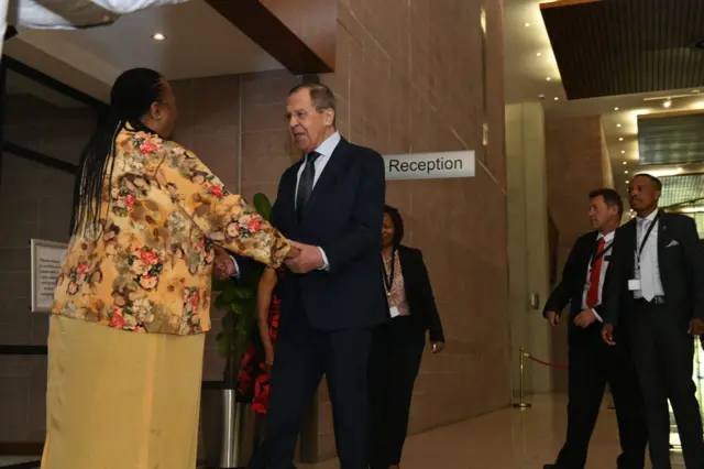 Sergei Lavrov being greeted by Naledi Pandor