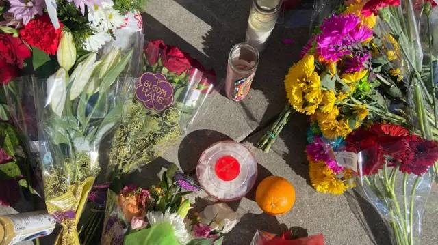 Floral tributes left outside the Star Dance Studio