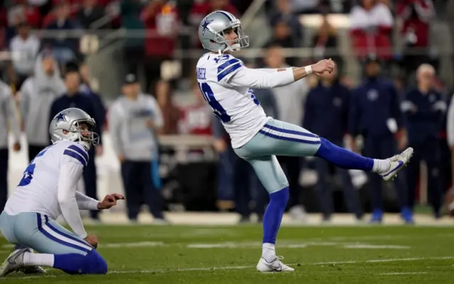 Brett Maher kicks a field goal