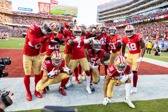 San Francisco 49ers players celebrate